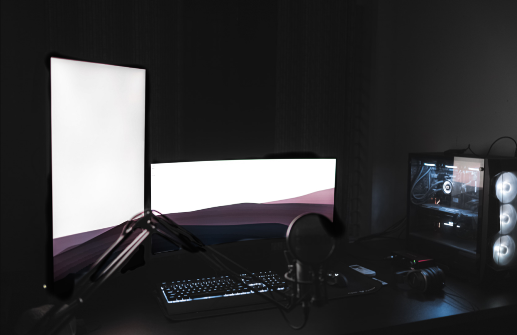 gaming monitor 1440p IPS VA comparison 2026 dark room setup